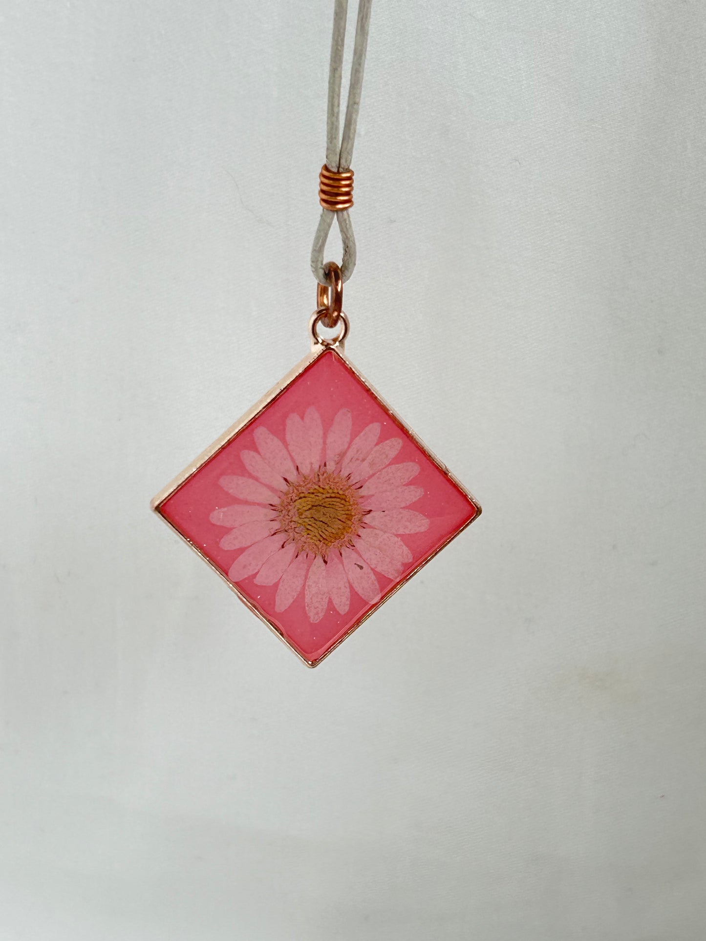 Light and Dark Pink Diamond shaped Pendant Necklace, Light Pink Daisy in a Rose Gold frame, Off-White Leather cord with Loop and Freshwater Pearl Closure