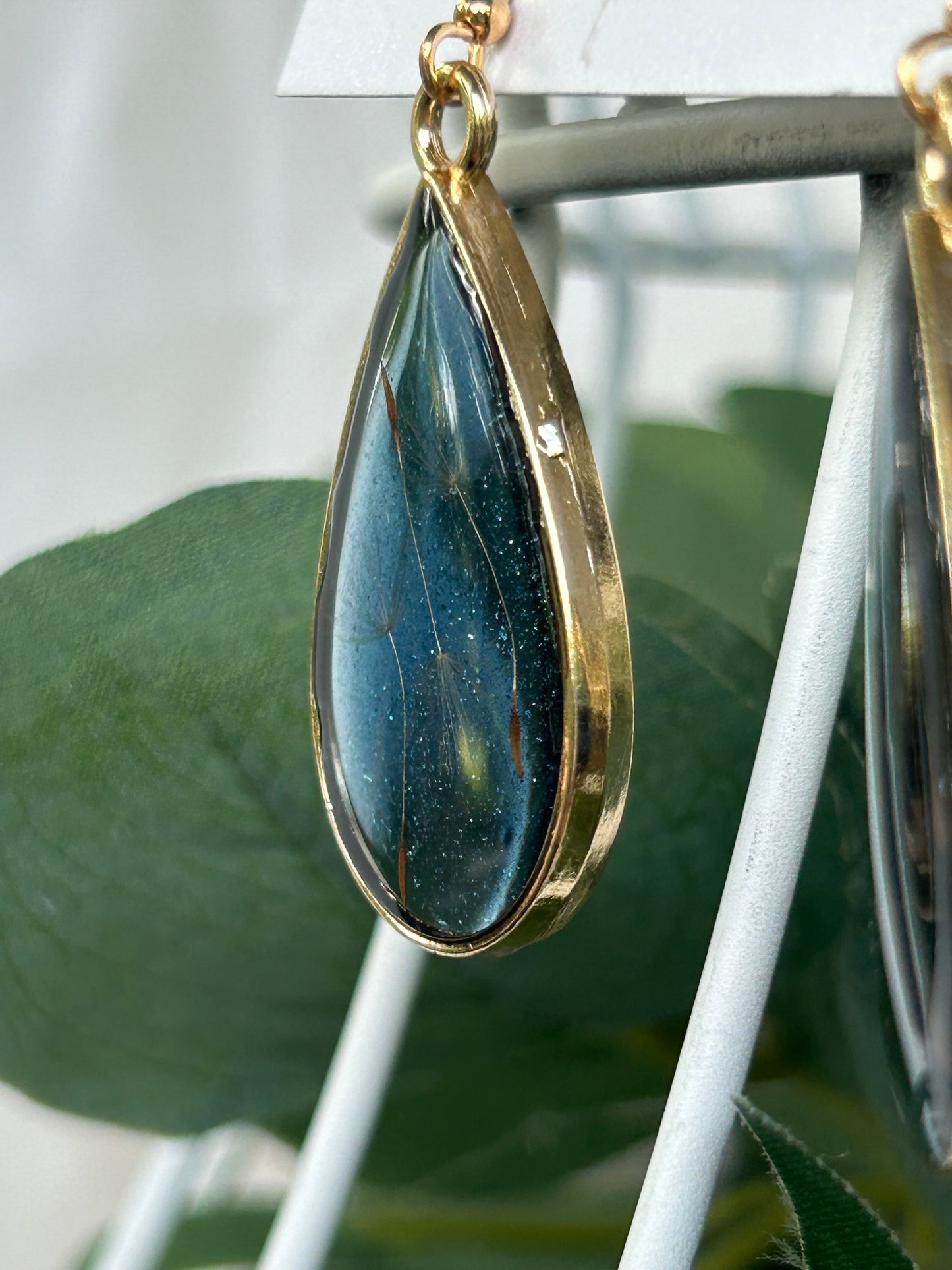 Make A Wish” Dandelion Seed Teardrop Dangle Earrings with a Blue Shimmery Background, Gold Frames