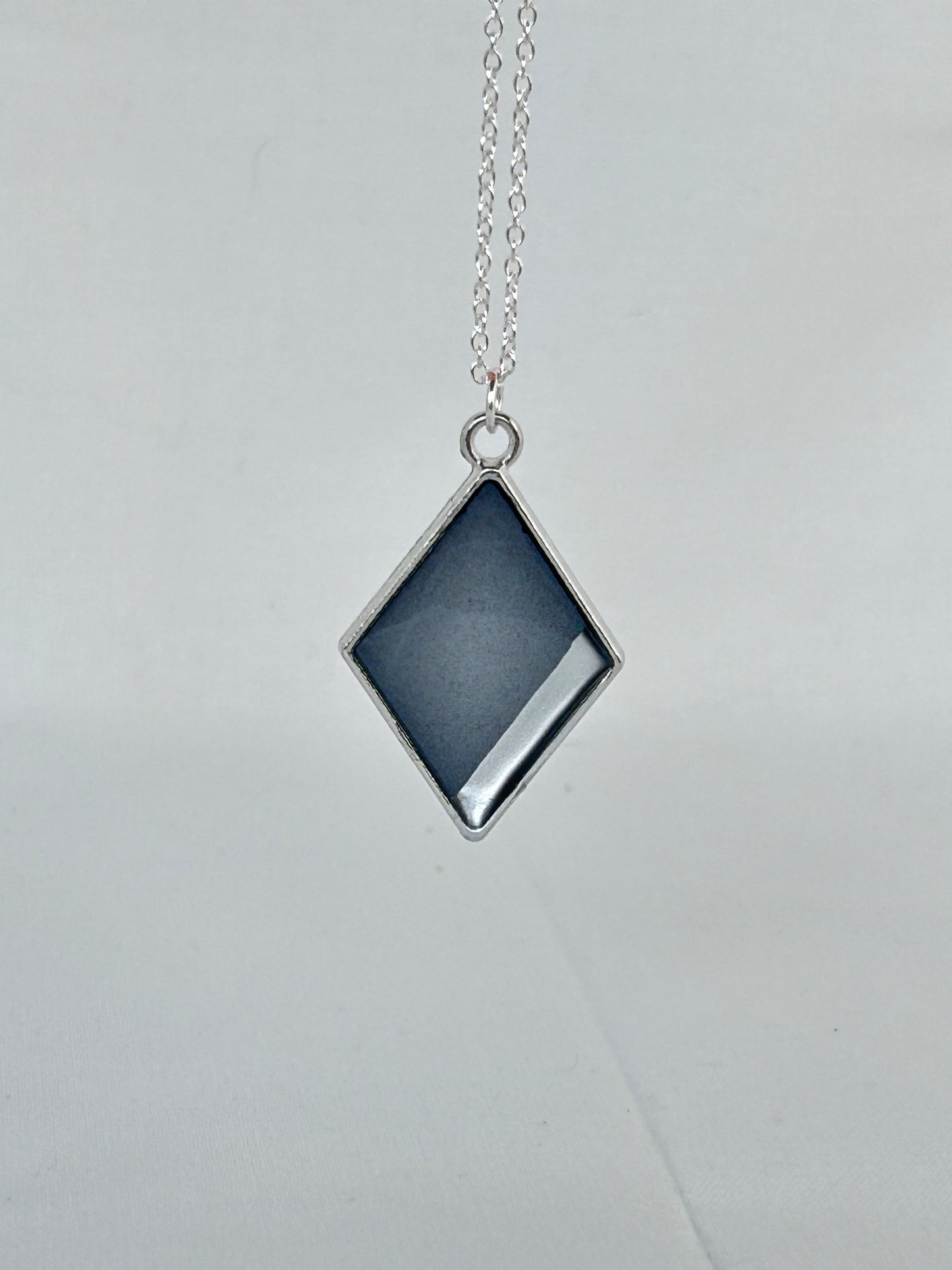 Smokey Black and Silver diamond shaped pendant necklace. Hand painted