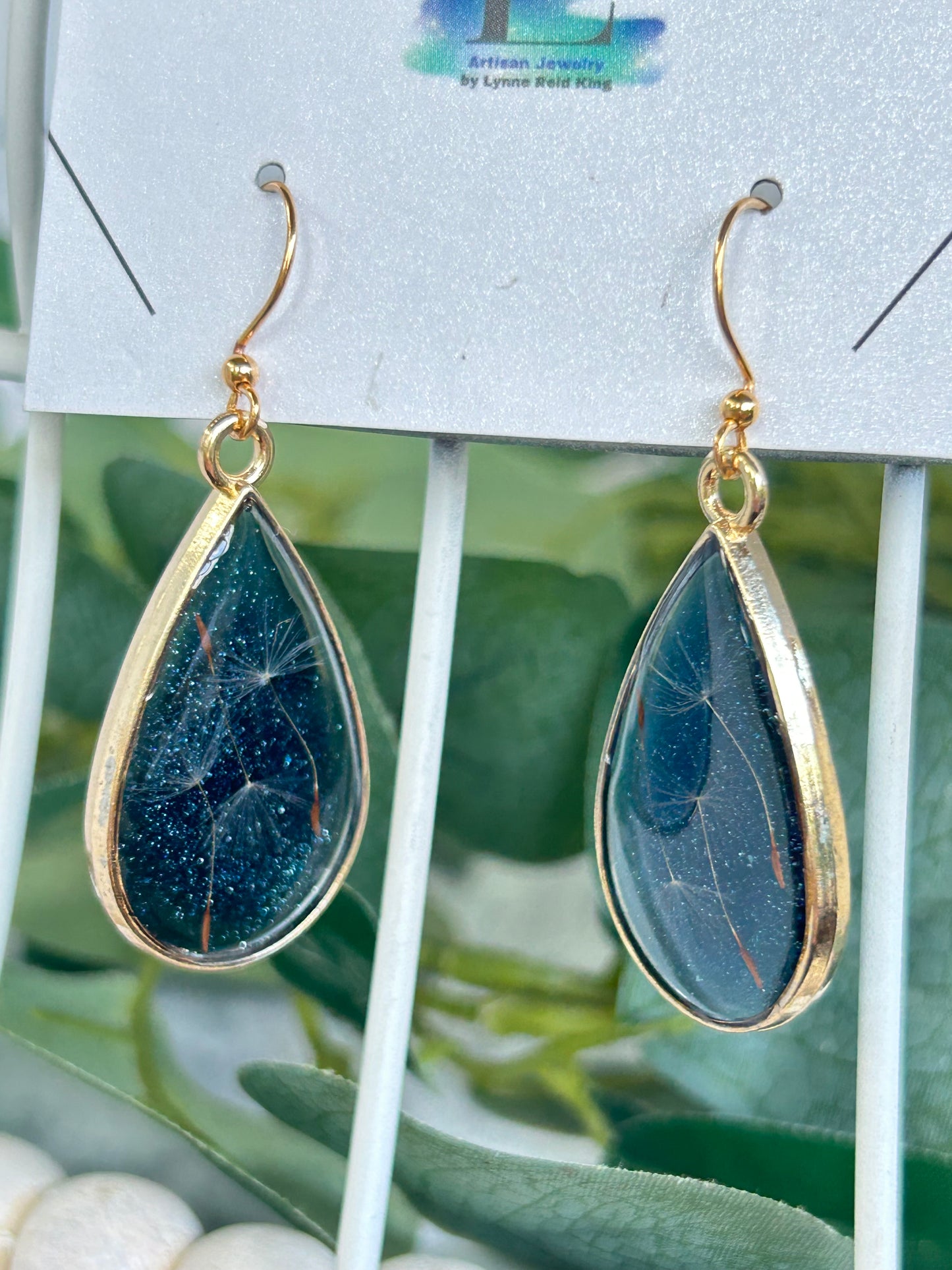 Make A Wish” Dandelion Seed Teardrop Dangle Earrings with a Blue Shimmery Background, Gold Frames