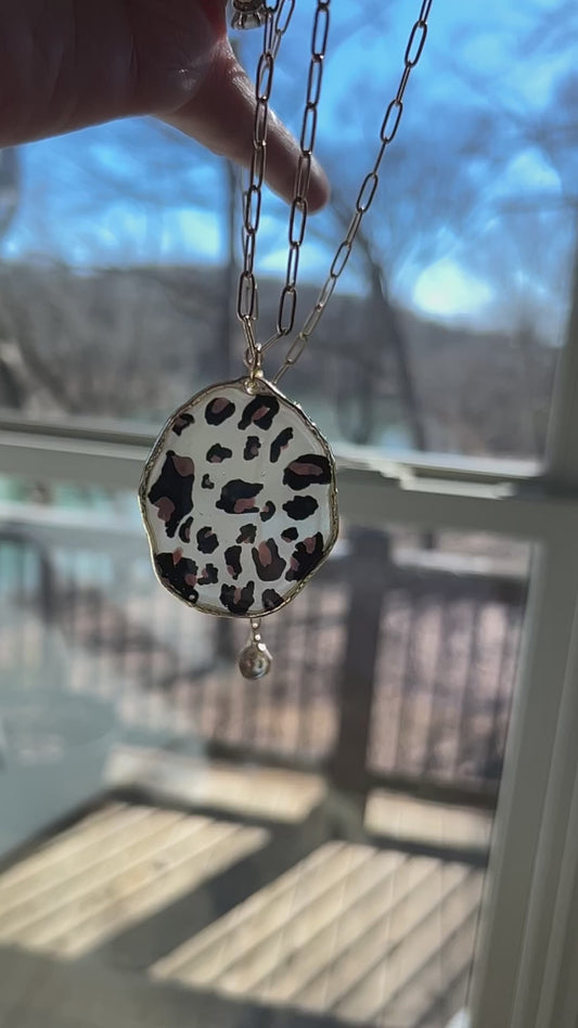 Handpainted Leopard Print Pendant Necklace, lightly tinted opaque resin, gold frame and 23” adjustable gold chain